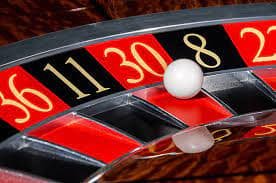 Gonzo's Quest reel layout showing 5 reels with cascading symbols and payout table